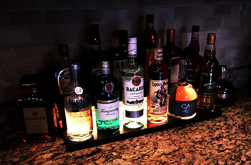 LED Counter Caddies™ - Walnut-Stained Straight Shelf - Liquor/Wine Bottle Display - bright light glow yellow orange